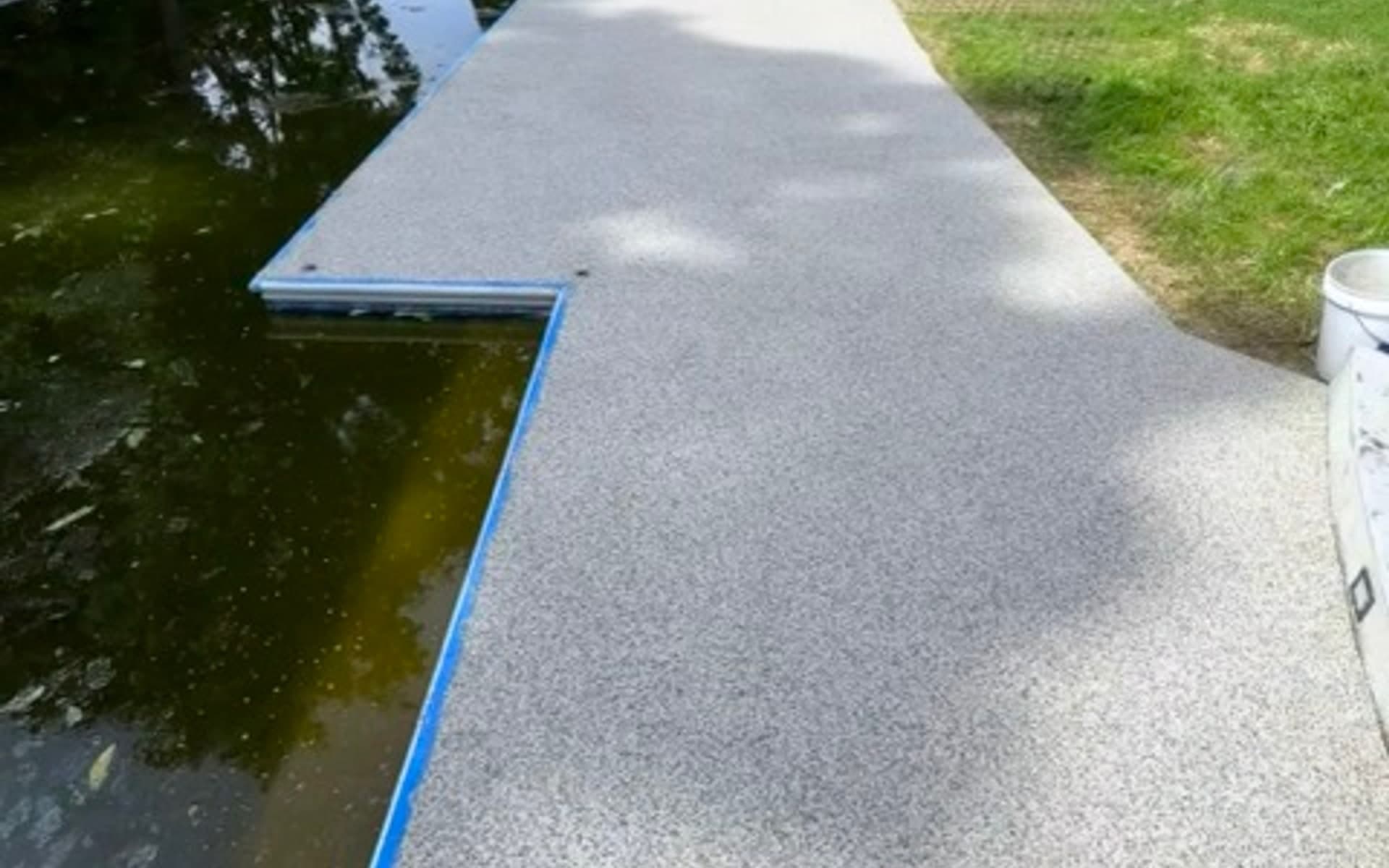 Sharonville pool deck after — Before + After resin-bound project
