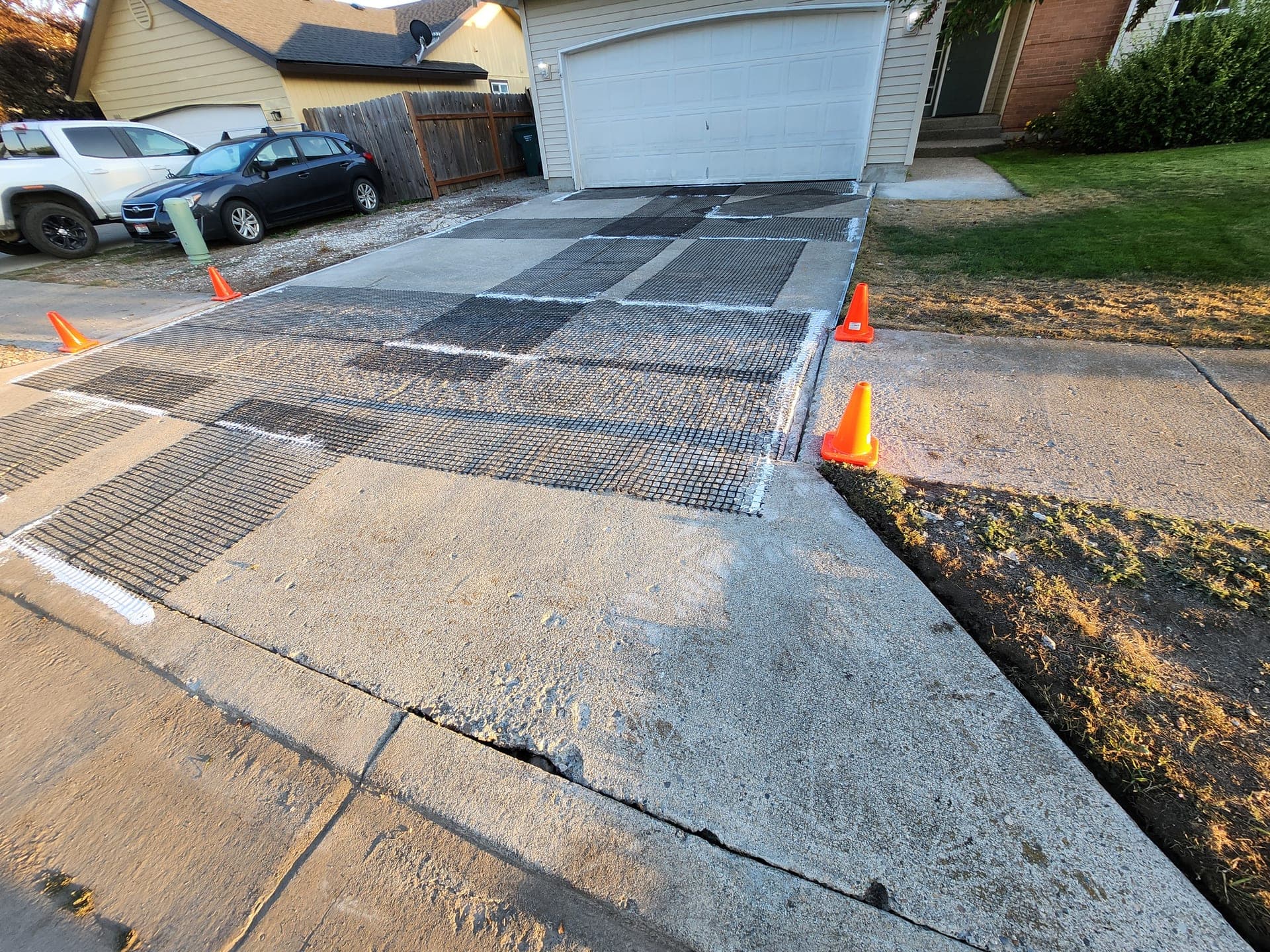 Grey mix driveway before resin-bound install