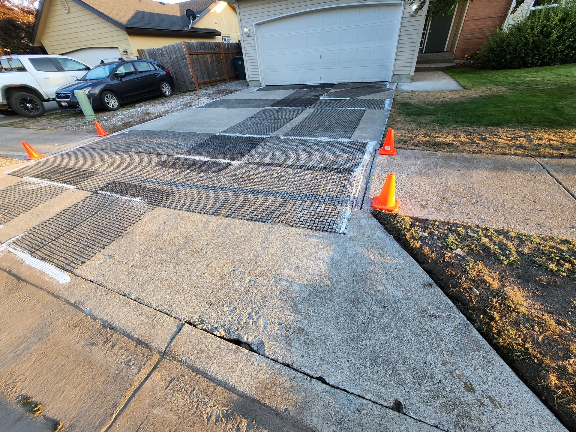 Grey mix driveway before resin-bound install